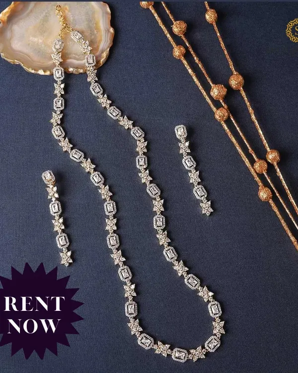 A delicate and elegant American Diamond necklace set. The simple, classic design makes it a versatile choice for receptions, parties, or even as a bridesmaid's accessory.