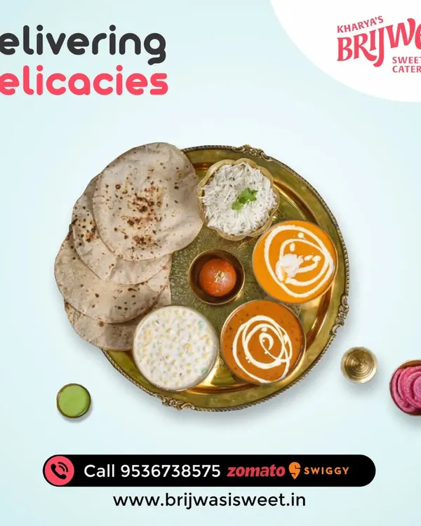 Delivering delicacies right to you. My vegetarian thali is a complete meal, featuring soft rotis, rice, two different curries, raita, and a gulab jamun for dessert.