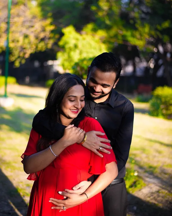 This is the kind of moment I live to capture. During a golden hour outdoor session, this couple shared a quiet, happy embrace. My goal is to create a relaxed space where these natural, unposed interactions can happen, resulting in timeless portraits filled with genuine affection.