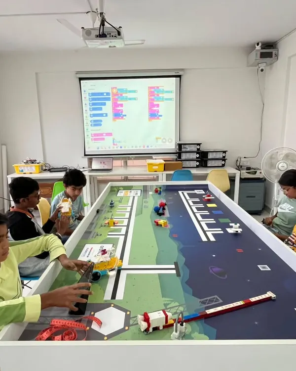 The competition floor is where skills are put to the test. Our students are hard at work, fine-tuning their robots and code for the World Robot Olympiad national round.