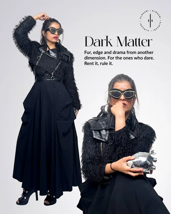 This look, 'Dark Matter', is all about drama. I've paired a black utility skirt with a textured fur and leather jacket and a metallic heart-shaped clutch to create a powerful, edgy look.