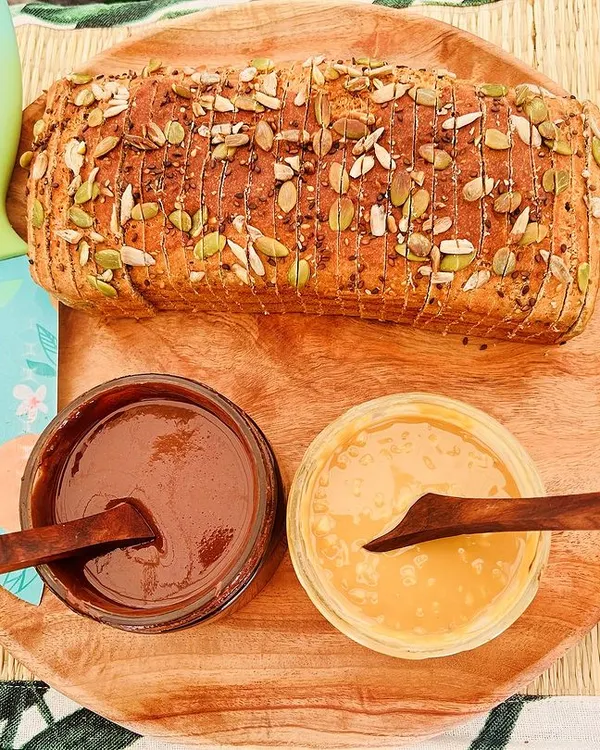 This is what Satvegik is all about. My signature flourless lentil bread, served with my homemade, preservative-free Hazelnut Cacao and Almond Butter spreads. It’s a complete, healthy, and satisfying meal.