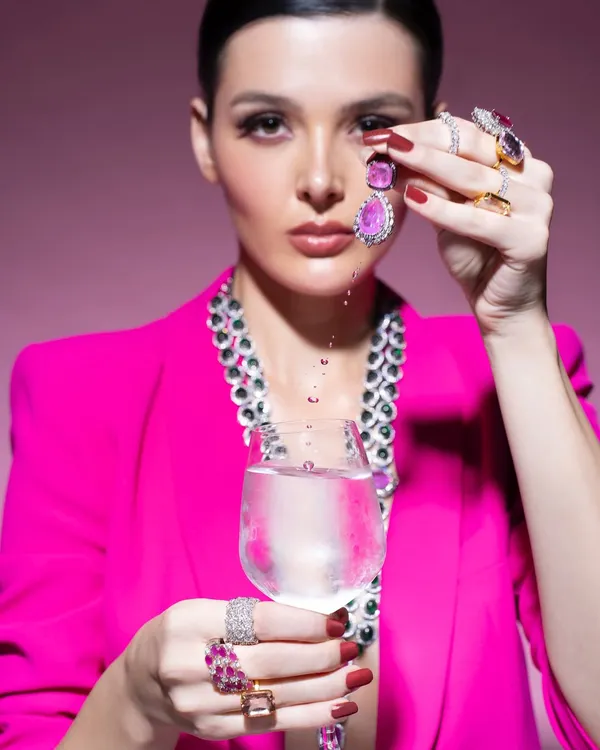 A creative shot from a jewellery campaign, using water to add a dynamic element. The focus is on the brilliant pink gemstone earring, showing how I use props to highlight the product.