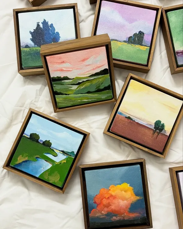 A collection of my miniature landscape paintings, each framed and ready to bring a small moment of scenery into a home. These small canvases are painted with just as much heart as my large murals.