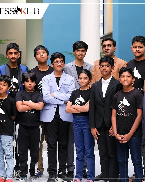 Our team of budding champions. This is the next generation of strategic thinkers, united by their love for chess and their matching ChessKlub shirts. We are more than a class; we are a team.