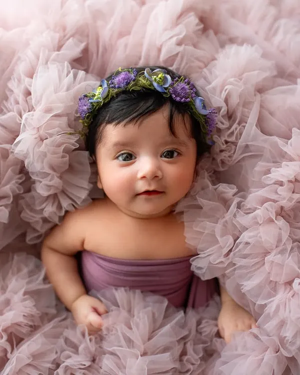 Those wide, curious eyes are just mesmerizing. Even when newborns are awake, we can capture beautiful, calm portraits.