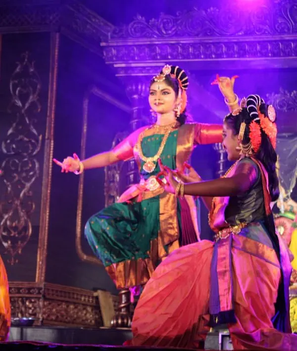 Our students presenting "Nava Durga" at the Hosdurga Navarathri festival. The dancers perform in front of a beautifully decorated idol of the Goddess, creating a truly devotional atmosphere.