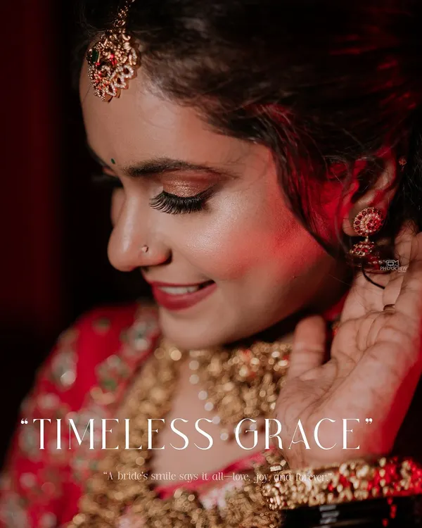 A close-up of a South Indian bride, capturing her gentle smile and the timeless grace of her traditional look.