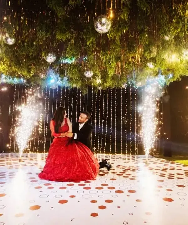 This is what I live for: creating that perfect, magical moment for my couples. Here, surrounded by sparks and lights, they are living their own Bollywood dream on their sangeet night.