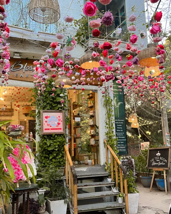 A floral fantasy awaits. Our entrance is adorned with enchanting blooms and warm lights, setting the perfect mood for a session of self-care.