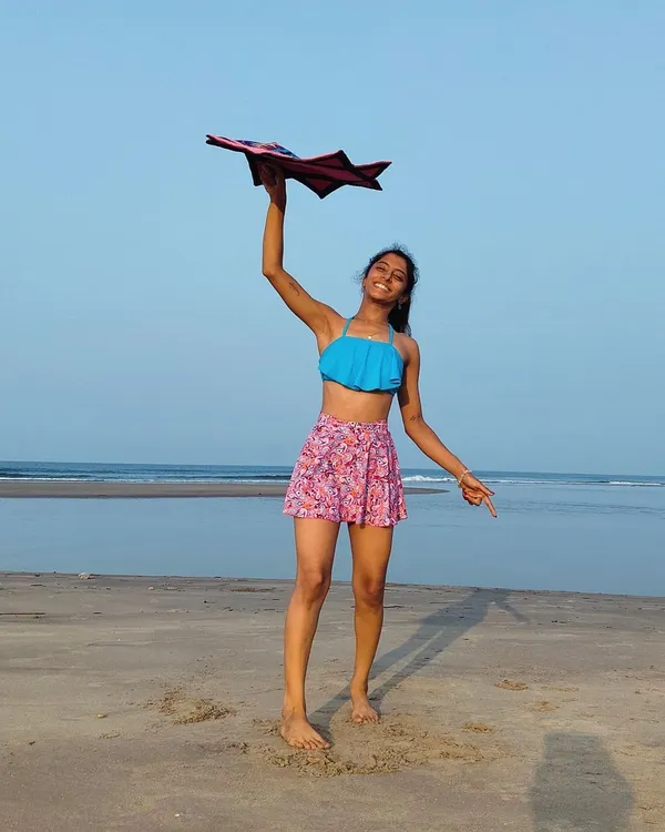 Spinning my dapo star at the beach in Goa. Dapo is a type of spinning cloth that is so much fun to play with, especially with the ocean breeze.