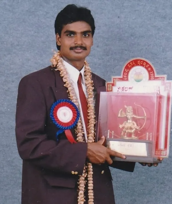 Holding the Arjuna Award, a symbol of my contribution to Kabaddi. This recognition fuels my passion to give back to the sport and mentor coaches who will continue this legacy of excellence.