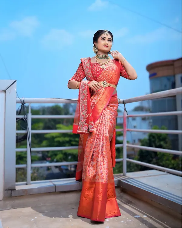 A full-length view of the traditional South Indian bridal look. I draped the rich Kanjeevaram saree and styled it with temple jewellery to create an authentic and regal appearance for the wedding ceremony.