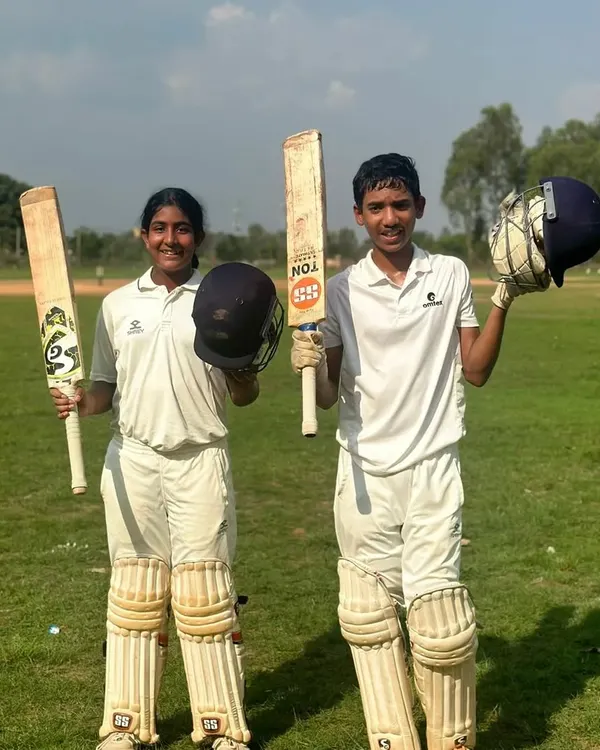 The century twins, Manan and Uma, celebrating their incredible partnership. It's a proud moment to see our U-14 players, a boy and a girl, both scoring hundreds in the same match, showcasing the depth of talent we nurture.