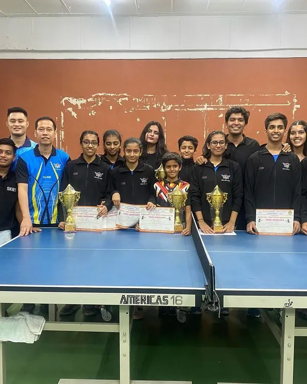 A clean sweep by our academy at the State Ranking Tournament. This group photo showcases the depth of our talent, with players holding trophies and certificates from their victories across multiple age categories.