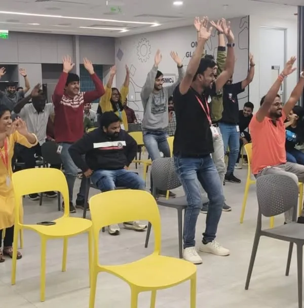I guide teams through energizing and accessible chair yoga sessions. This is a great way to break up the workday, boost morale, and relieve tension without anyone needing to change their clothes or leave the office space.