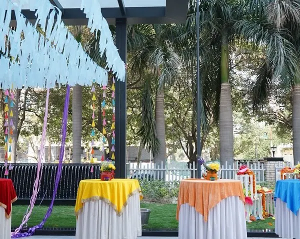 Bringing the festival of colors to the workplace. For this corporate Holi event, I set up brightly colored tablecloths and simple centerpieces to create a festive lunch area for employees.