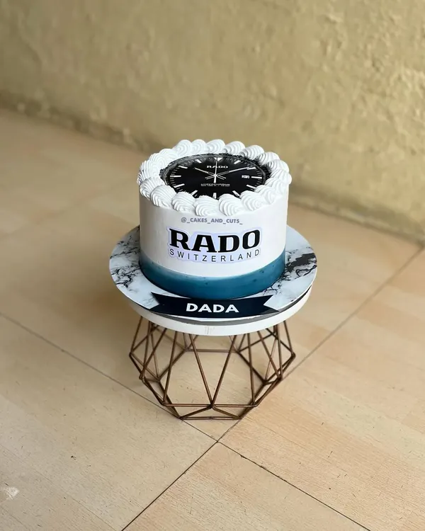 A cake for the watch lover. This RADO-themed cake features an edible image of the watch face and logo, perfect for a husband, dad, or brother.
