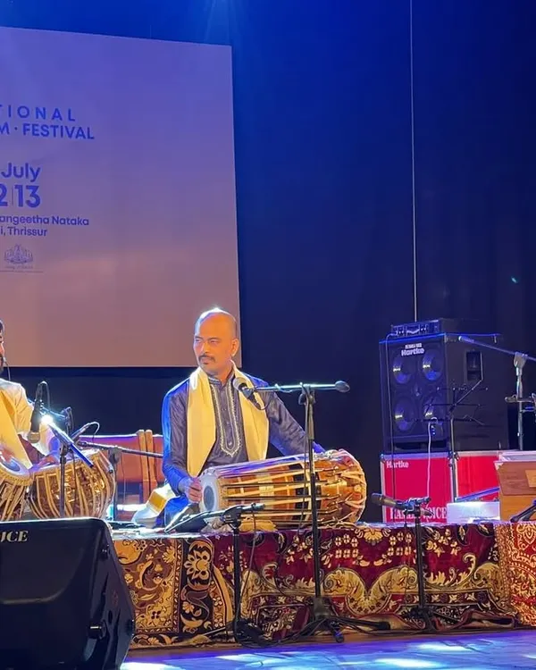 A dynamic percussion duet with Sukhad Munde on pakhawaj at the National Rhythm Festival in Kerala. The interplay between tabla and pakhawaj creates a powerful rhythmic tapestry.