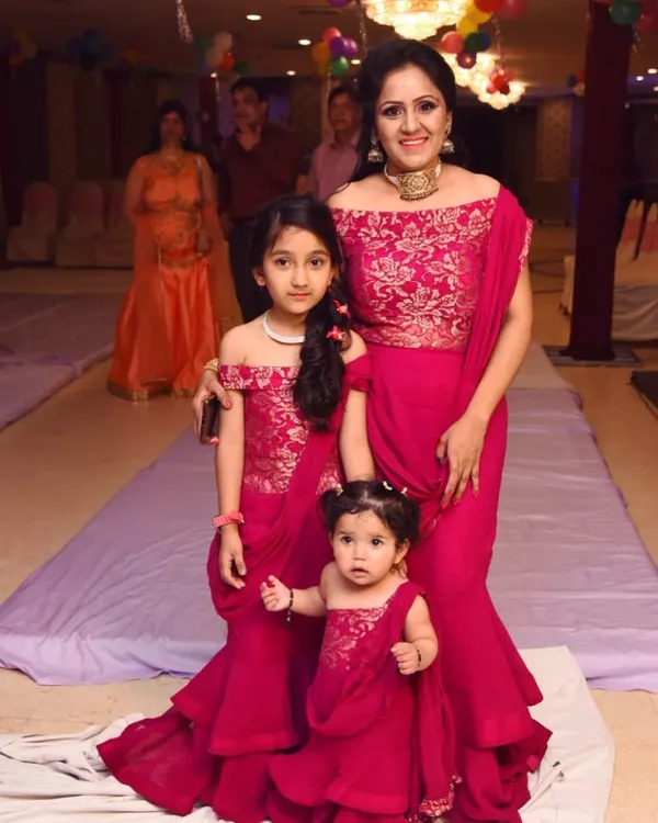 This is what makes my work so rewarding. I designed these matching magenta gowns for a mother and her two lovely daughters for a special birthday celebration. Creating coordinated family outfits that are both beautiful and comfortable is one of my favorite things to do.