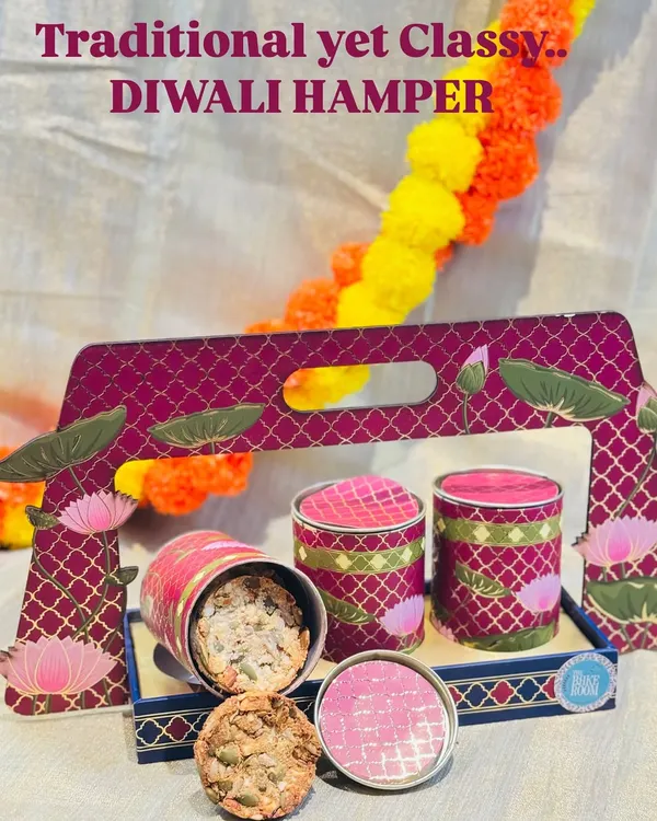 My premium three-jar Diwali hamper is perfect for corporate or family gifting. It includes our signature 7-Seeds Nuts Cookies, Artisanal Truffle Cubes, and Toasted Almond Stacks in a reusable decorative tray.