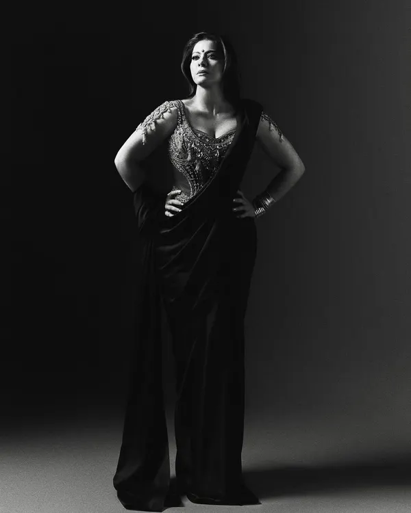 For Kajol's first look for the film 'Maa', we channeled the powerful energy of Goddess Kali. This custom black saree with a gold corset blouse, designed as modern armor, embodies a raw, fierce, and unapologetic spirit.