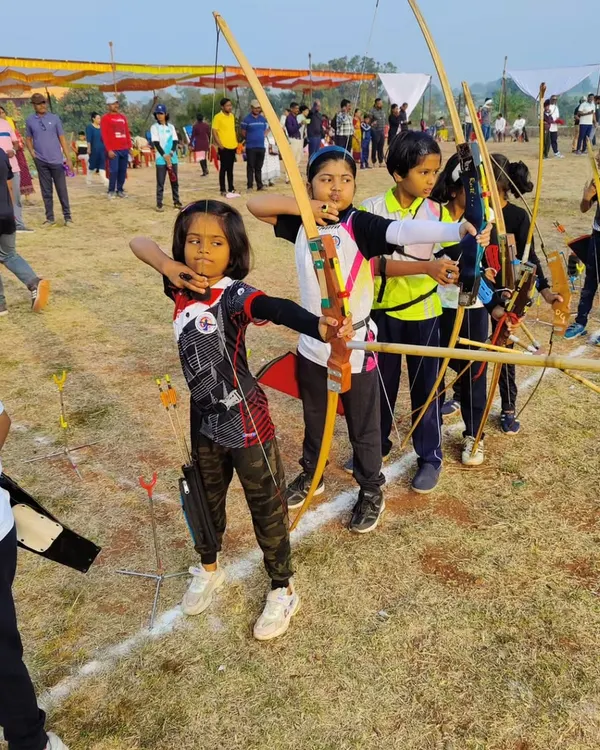 Our youth archery program starts with strong fundamentals. Here, young archers learn discipline and focus using traditional Indian wooden bows during a state competition.