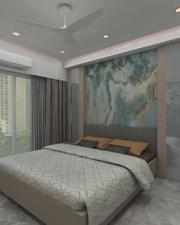 An abstract blue and white marble-effect wallpaper creates a serene and artistic feature wall behind the headboard, adding a touch of modern luxury to this bedroom.