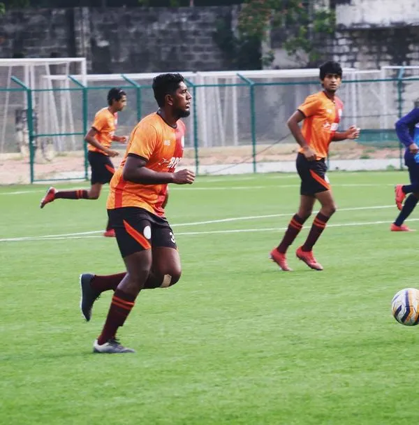 Players on the move during a training drill. Our sessions are designed to be high-intensity to simulate match conditions.