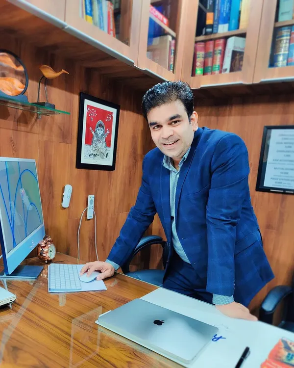 Advocate Varun Chaudhary in our firm's office. I am always available to discuss your case and provide clear, strategic legal advice.