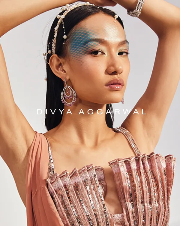 A close-up of the shell-inspired 3D blouse from the Mira Saree Set, showcasing its unique pleated and embellished texture.