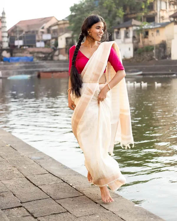 This is the essence of my Indian wear modeling. I focus on bringing a sense of grace and life to the garment, capturing the timeless elegance of a classic silk saree in a natural, serene setting.