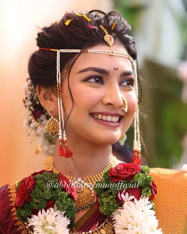 This radiant smile says it all. I aim to create a bridal look where you feel completely yourself, just more special, ensuring your natural beauty shines through on your big day.