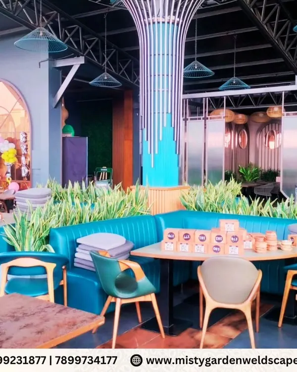We transformed the outdoor area of Skydeck, a commercial establishment, into a vibrant and refreshing space for customers. The design incorporates lush greenery around the seating areas to enhance the ambiance and overall experience.