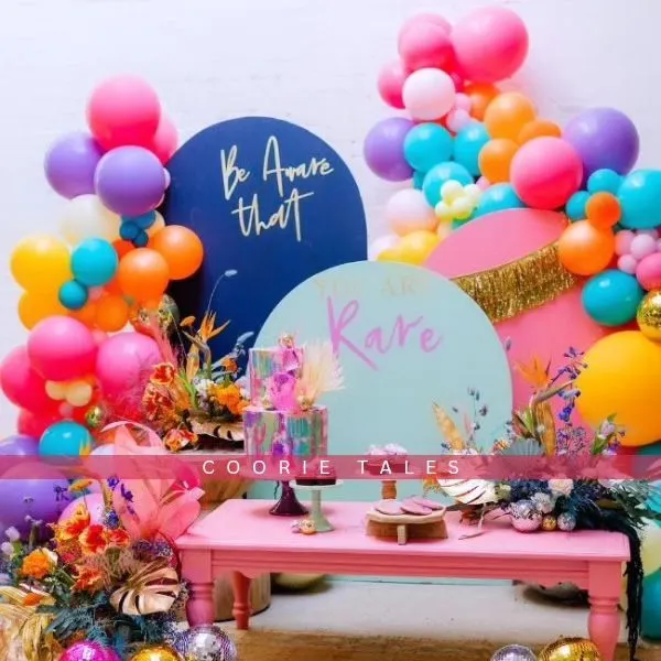 For those who love to live in color, we design vibrant, high-energy celebrations that pop. This setup features a bold and eclectic mix of colorful balloons, floral arrangements, and custom signage for a truly unique and joyful party.