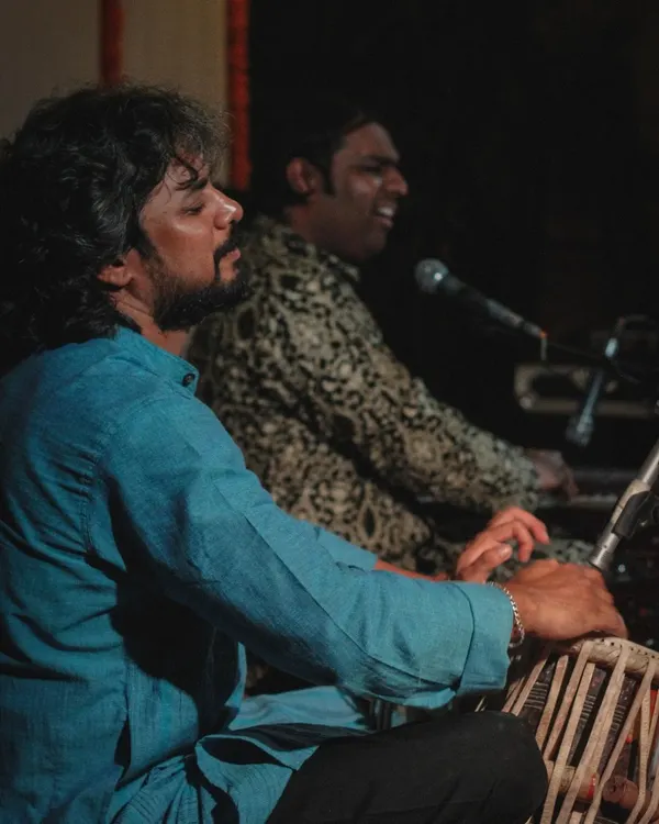 For me, music is a conversation. This is a moment of deep focus during a ghazal performance, where I am completely absorbed in the dialogue between the vocals, the harmonium, and my tabla.