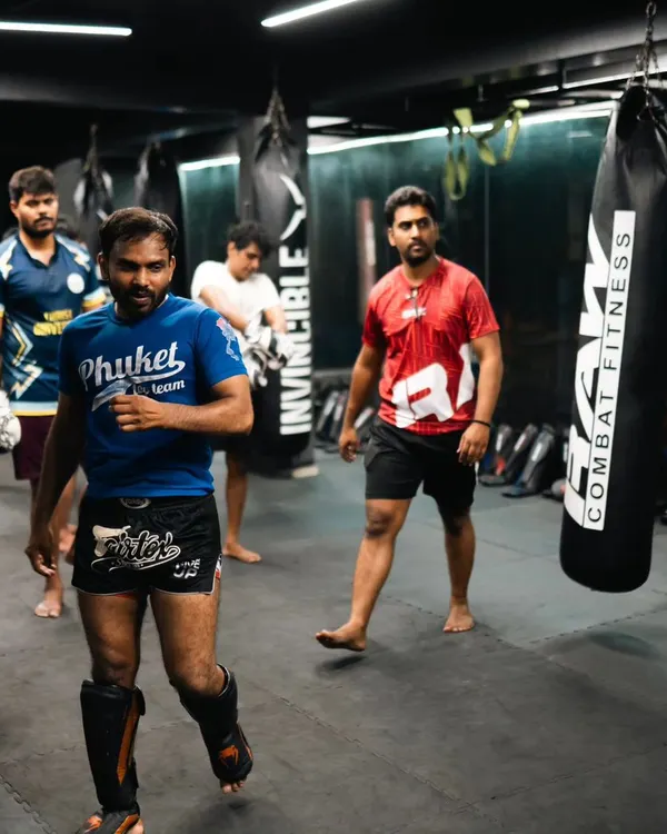 The calm before the storm. Our members getting ready on the mats, a community of individuals preparing to push their limits together.