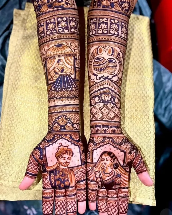 A classic portrait design featuring the bride and groom, each on one palm, ready to be joined together. This style of figurative mehndi is a beautiful way to celebrate your union.