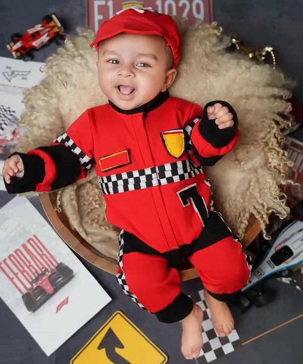 Ready, set, go! This little F1 racer is wide awake and full of personality. I have a collection of fun costumes and props to match any hobby or passion, creating a truly personalized newborn photoshoot.