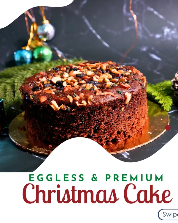 This is my premium, eggless Christmas plum cake, a dense and flavorful cake packed with high-quality nuts and dried fruits. It's a classic holiday dessert, perfect for gifting or serving to your loved ones.