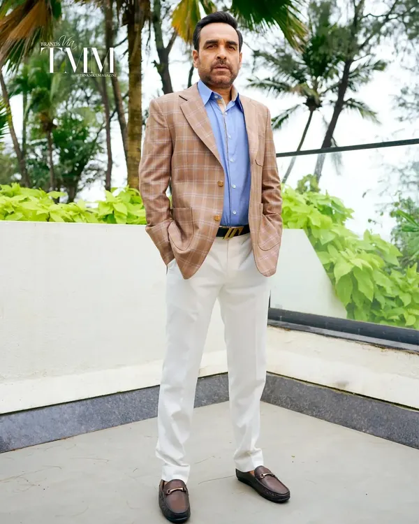 The esteemed actor Pankaj Tripathi in our custom-made plaid blazer and white trousers. His look is a perfect embodiment of the subtle, sophisticated, and statement-making style we champion.