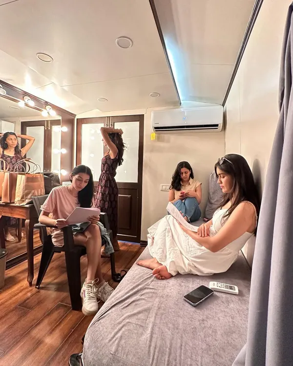 A candid moment in the vanity van with the cast of 'Dange/Por'. These moments of rest and preparation between intense scenes are where we all bonded.