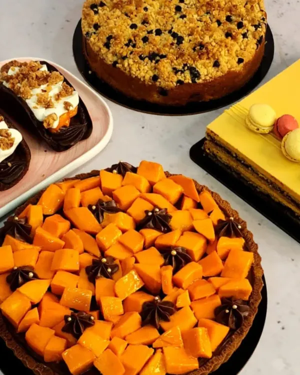A glimpse of May at The Baking Gurl, which means it's all about mangoes! This spread features my mango tart, mango opera cake, and other mango-infused desserts.