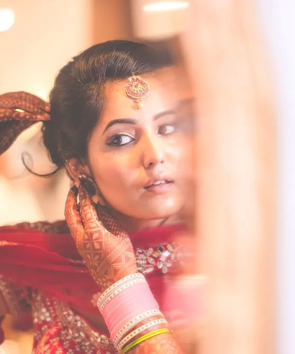 A quiet moment of reflection for the bride before the ceremony begins. I ensure my brides have a calm and stress-free environment to get ready in.