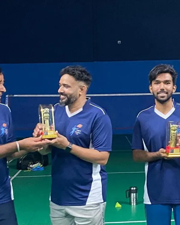 Members of our "Team Avengers" receiving their trophies after a competitive tournament for adult players held at our facility.