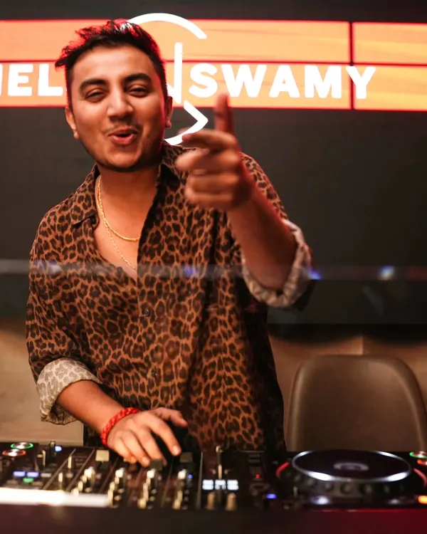 Pointing to the crowd, making a direct connection. I make sure everyone feels seen and included in the party. Your energy fuels my performance.
