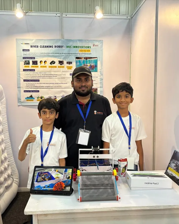 Here are our young engineers, Surya and Ronit, proudly presenting their award-winning AI River Cleaning Robot. They used an Arduino and an AI camera to design a solution for a real environmental issue.