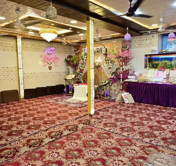 A wide view of our banquet hall, set up for a celebration. The space is versatile and can be decorated to suit any occasion, from a festive Iftar gathering to a wedding.