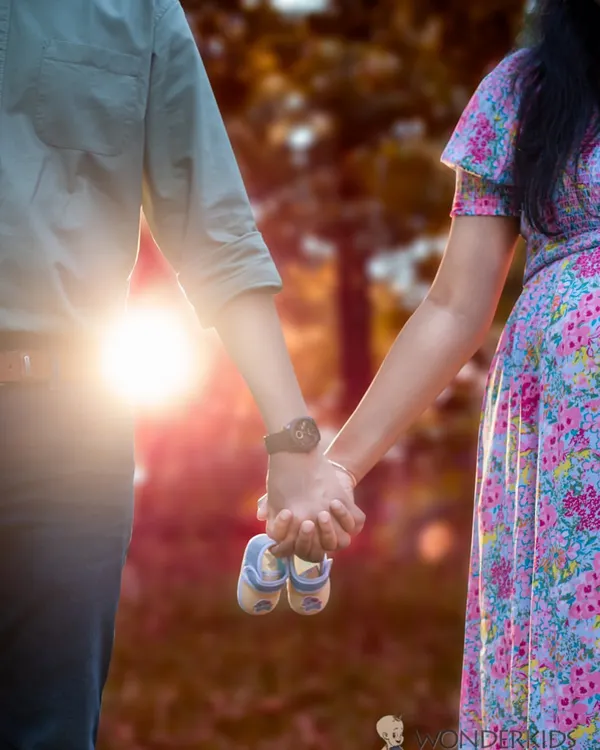 Sometimes the smallest details tell the biggest story. A simple prop like a pair of baby shoes held between an expecting couple adds a layer of sweet anticipation to your maternity photoshoot.