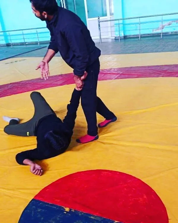 A look at our wrestling and grappling training. Here, a student learns how to execute a takedown and control an opponent on the mat.